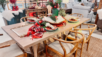 Solid wood dining table and chairs inside Showhome Furniture Calgary