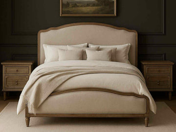 Beige upholstered Interlude bed in Calgary with matching headboard in a bedroom setting.