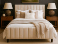 Beige Brit bed in Calgary from Showhome Furniture with matching headboard and nightstands in a bedroom setting.