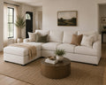 Cream sectional sofa with chaise in a warm modern living room.
