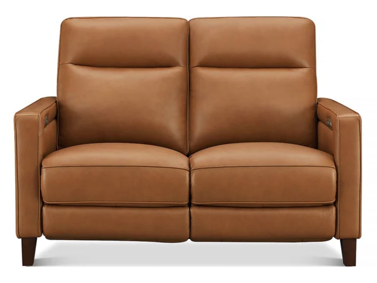 Warm brown leather two-seat sofa with smooth upholstery, structured high back cushions, boxy arms, and tapered wooden legs on a white background.