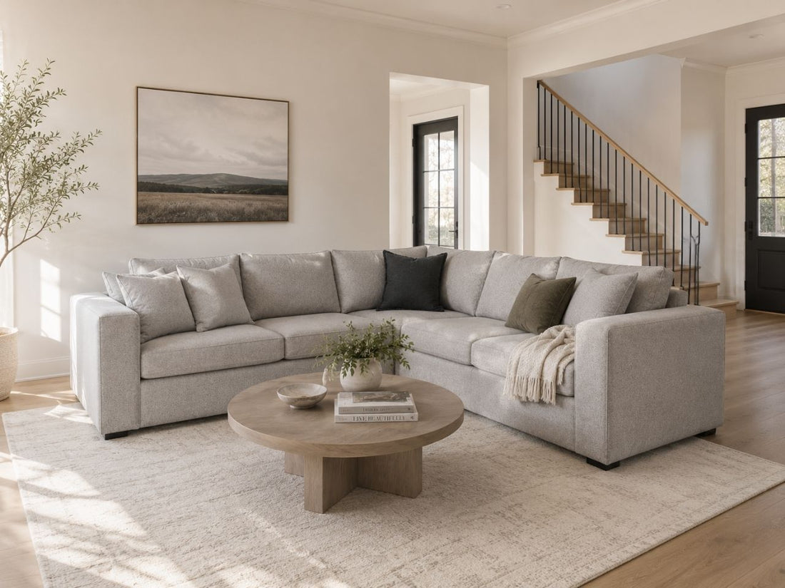 Gray fabric sectional in a bright modern living room.