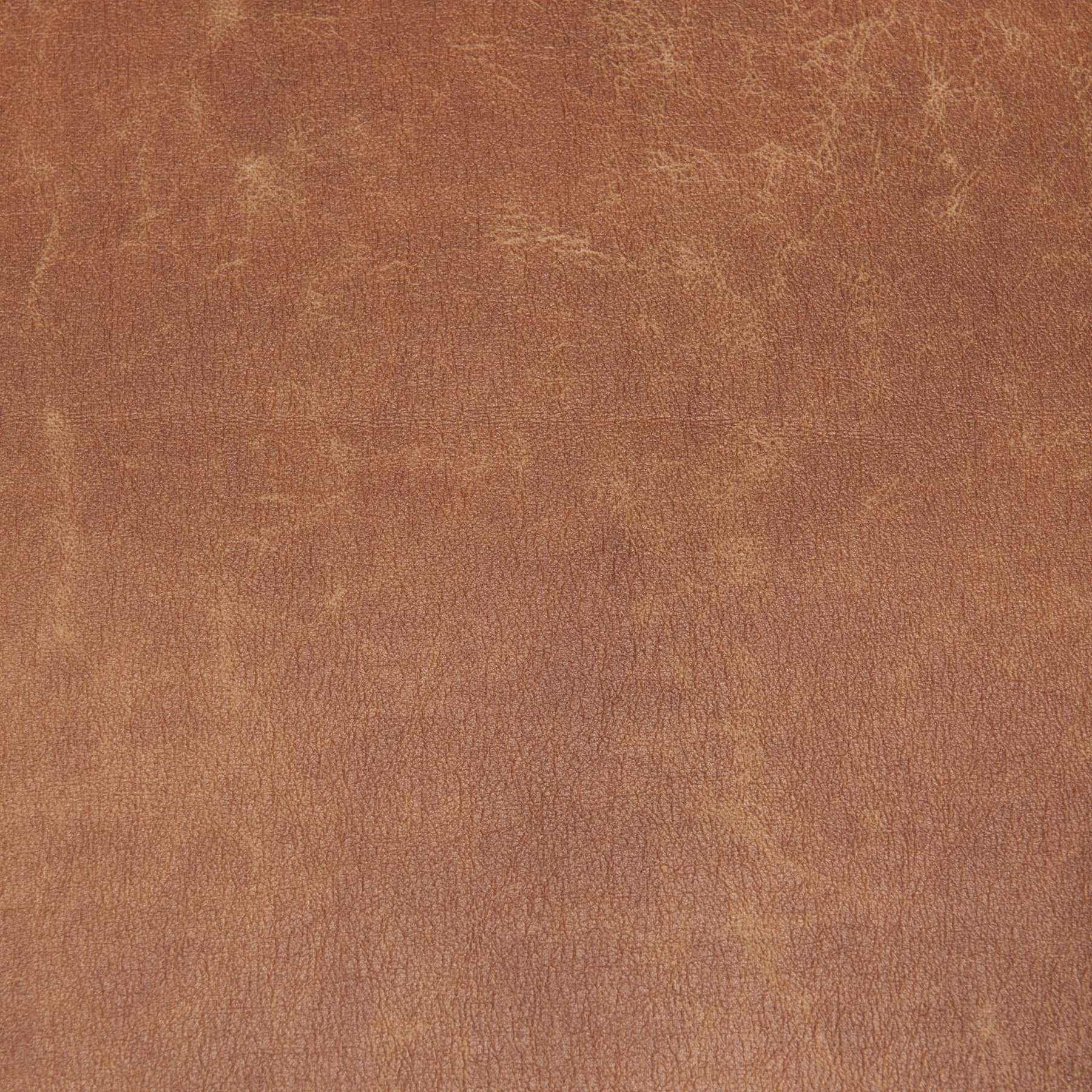 Close-up of Raeleigh Tan Faux Leather Accent Chair in Calgary