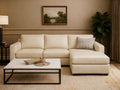 A Custom leather sectional sofa with a right-facing chaise lounge in a warm, neutral living room.