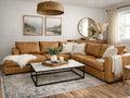 Tan leather sectional sofa styled in a warm living room with a marble-top coffee table and neutral decor.