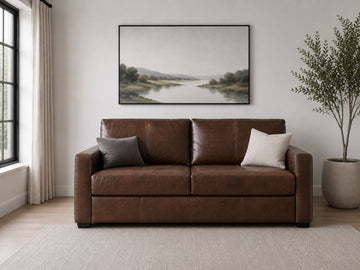 Brown leather sleeper sofa with clean modern lines.