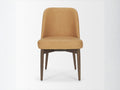 Tan upholstered dining chair with wooden legs on a white background, front view.