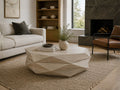 Geometric light wood coffee table with a faceted design styled in a modern living room.