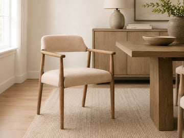 Artemis Oyster Beige Upholstered Dining Chair in a dining room setting. 