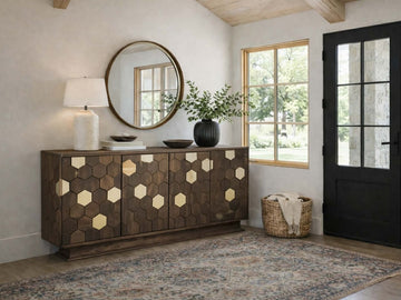 A dark wood sideboard featuring a geometric honeycomb pattern across its four doors.
