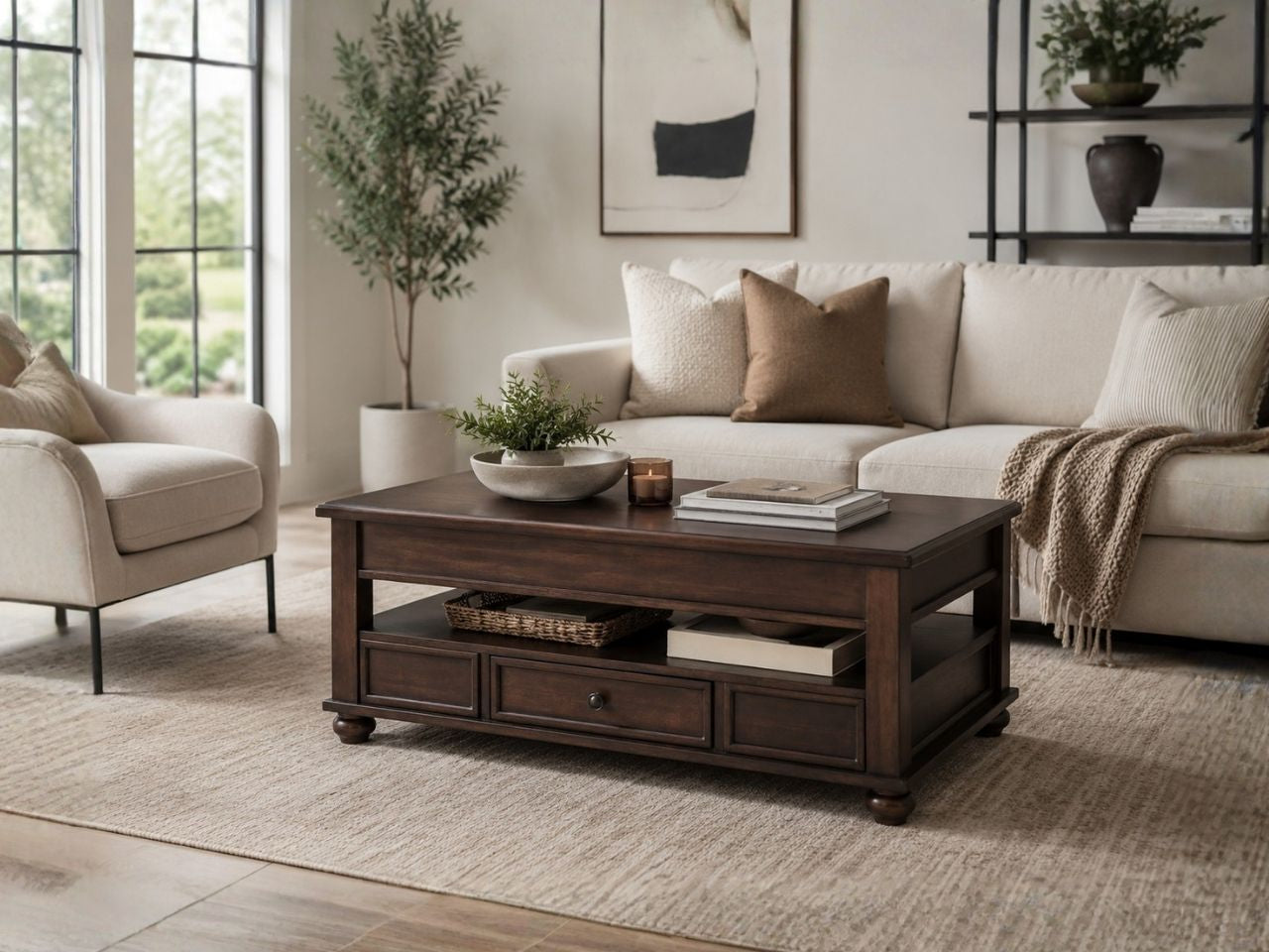 Traditional dark wood coffee table with lift-top storage, open shelving, and drawers, styled in a cozy neutral-toned living room.