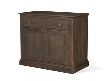 Brown solid wood accent cabinet with drawer and double doors on a white background.
