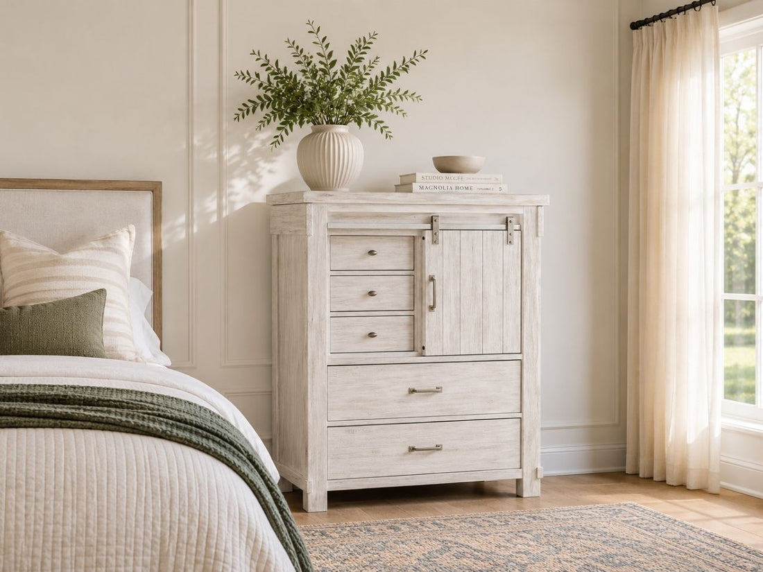 Whitewashed farmhouse chest with sliding barn door and storage drawers.