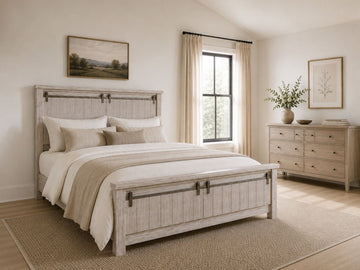 Whitewashed panel bed with sliding barn-door accents in a cozy farmhouse-style bedroom.