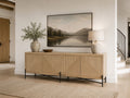 Light wood sideboard with textured geometric doors and metal legs.