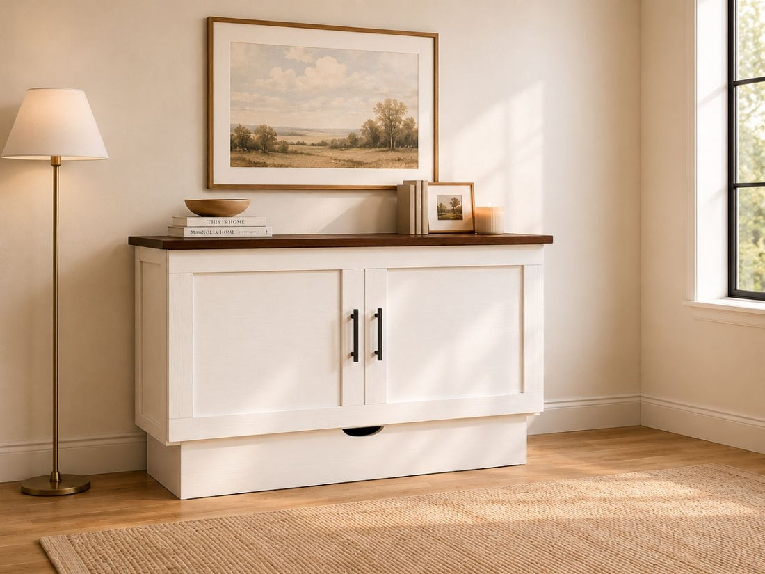 White farmhouse-style Murphy bed cabinet with contrasting wood top, shaker-style doors, and warm neutral decor.