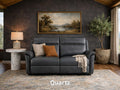 A dark gray leather sofa providing a sophisticated, monochromatic look.