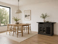 Rustic kitchen island with wine storage in a modern dining room.