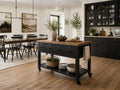 Brown wood rolling kitchen island with drawers and open storage.