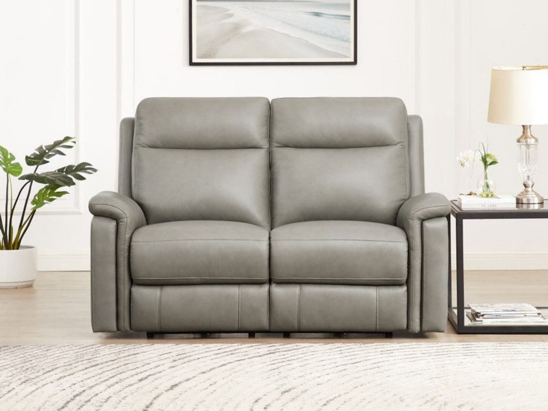 Gray zero gravity loveseat in a bright living room