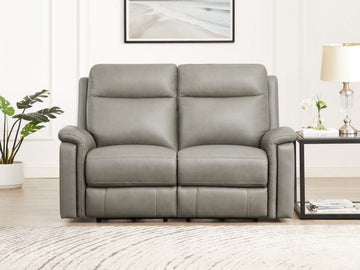 Gray zero gravity loveseat in a bright living room