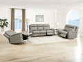 Gray zero gravity reclining seating set in a bright living room