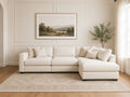 Cream sectional sofa with chaise in a bright, modern living room.