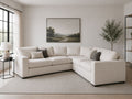 Cream leather sectional with modern styling and spacious seating.