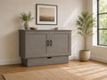 Modern grey Murphy bed cabinet with clean shaker-style doors, minimalist hardware, and soft neutral room decor.