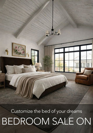 Modern bedroom with large windows and a bed, featuring a sale advertisement.
