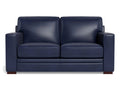 A two-seat leather loveseat with a modern, boxy silhouette, wide arms, and smooth cushions, upholstered in deep navy blue leather and shown against a white background.