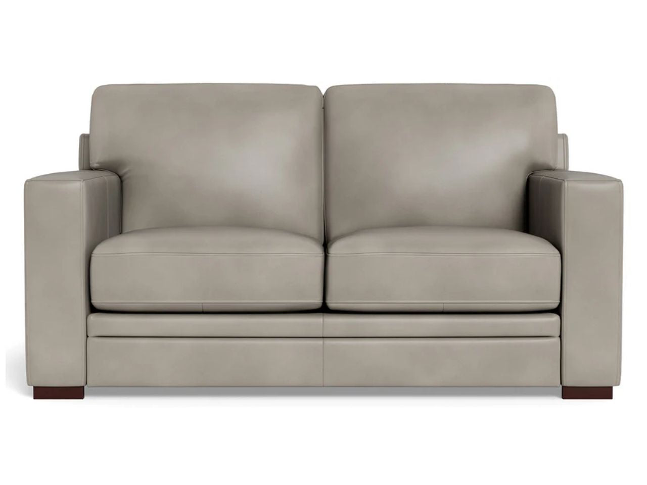A two-seat leather loveseat featuring a clean, modern silhouette with box-style cushions and wide arms, upholstered in a light grey leather and photographed against a white background.