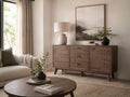 Clean-lined sideboard with spacious drawers and a warm mid-century design.