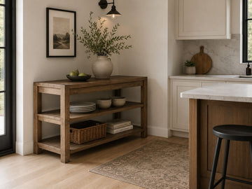 Wood kitchen island with open shelving in a bright modern kitchen.
