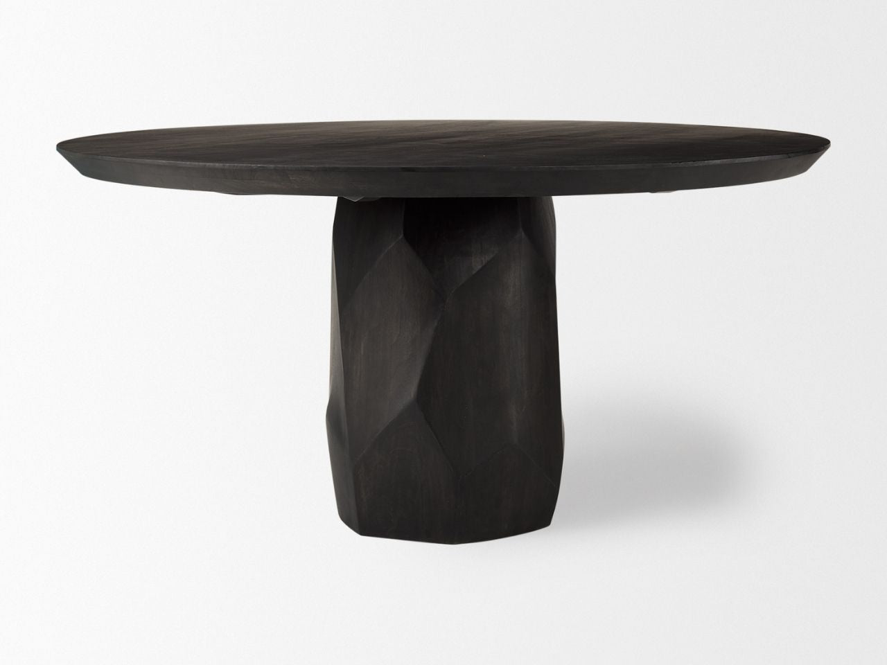 Dark wooden table with a unique base design on a white background