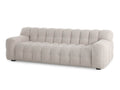 Three-seat sofa with plush channel-tufted cushions, upholstered in soft fabric, shown on a white background.