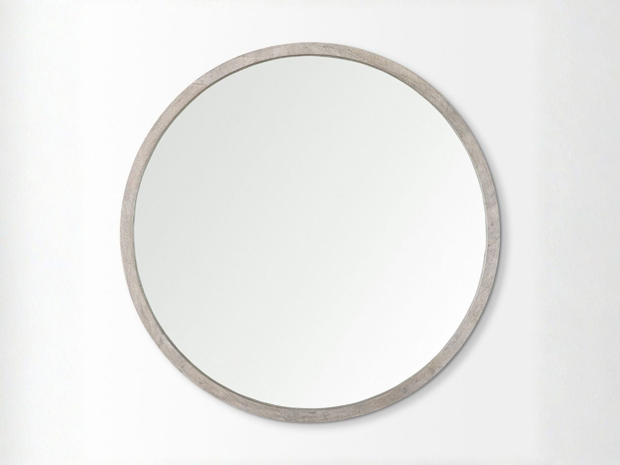 Round mirror with a wooden frame in Calgary on a white background