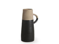 Ceramic pitcher with black and beige design in Calgary on a white background