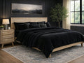 Gia Light Finish Solid wood Bed with a black blanket. 