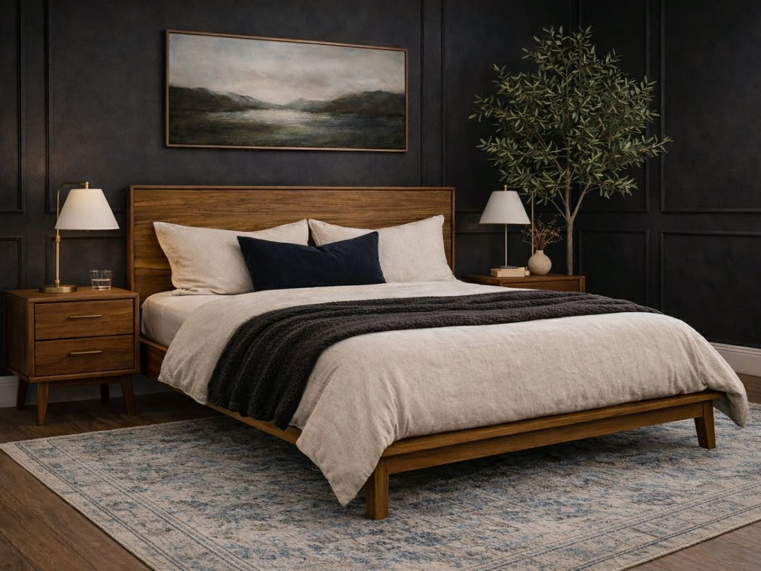 Gia King Bed in Warm Pecan solid wood with nightstands, and two lamps against a dark wall