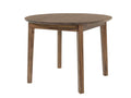 Round wooden dining table with four legs on white background.