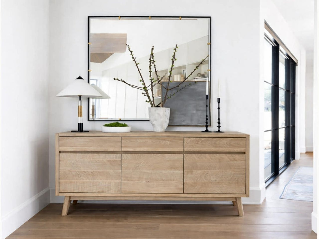 The Gia Sideboard is a contemporary storage piece made from light-finished wood with a visible grain.