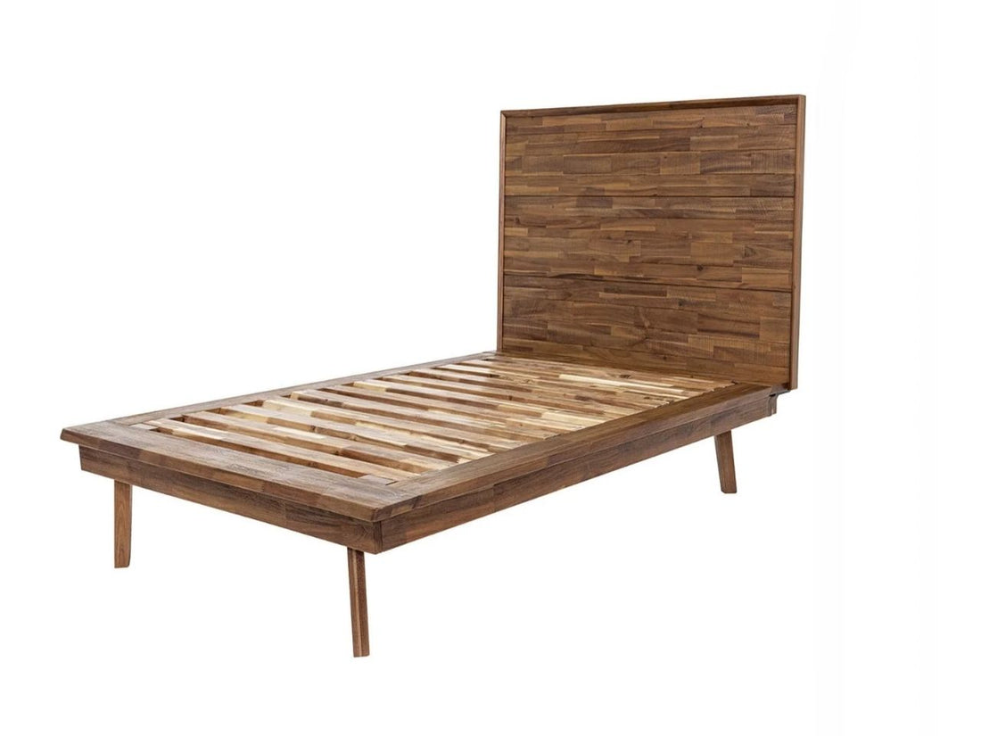 Solid wood platform bed in a warm pecan finish, styled in a neutral bedroom with white bedding and matching nightstand.