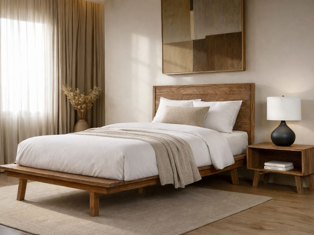 Solid wood platform bed in a warm pecan finish, styled in a neutral bedroom with white bedding and matching nightstand.