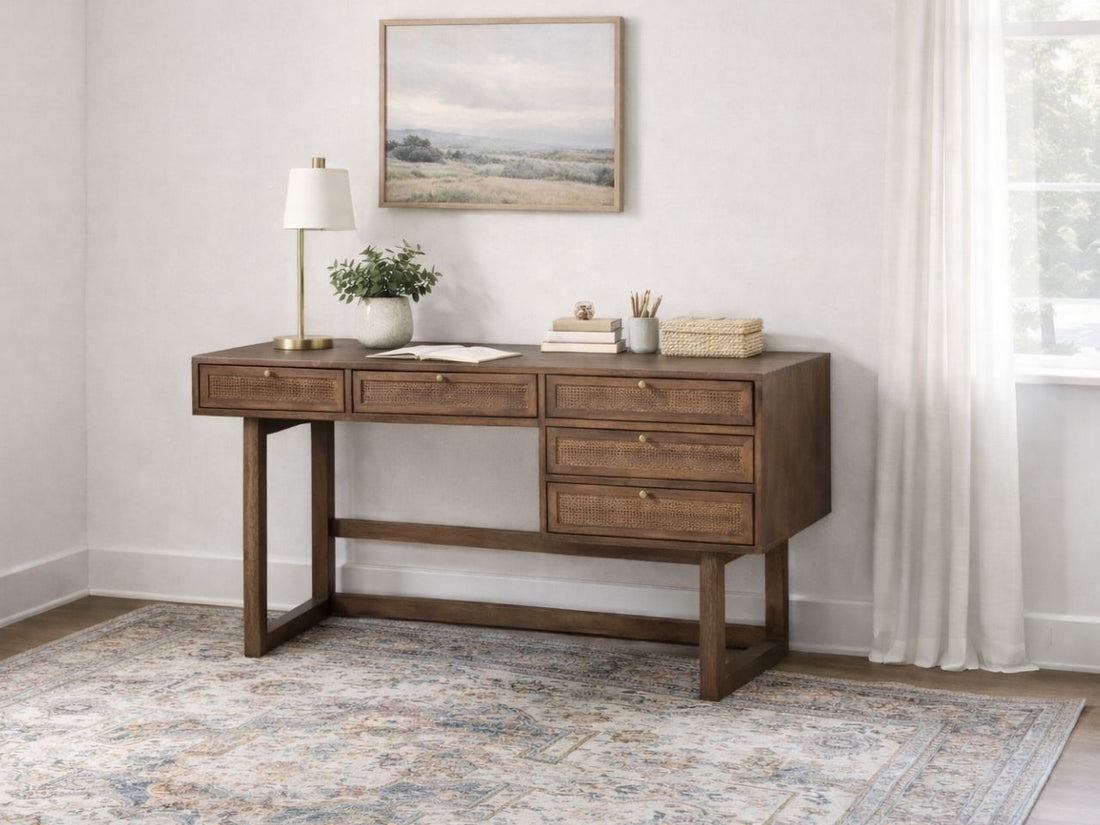 Wood office desk with rattan drawer fronts and storage in a home office.