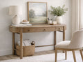 The Hadleigh Desk features a soft, transitional design with a distinct oval-shaped tabletop.