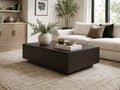 Dark wood rectangular coffee table in a modern living room.