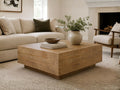 Light wood square coffee table in a modern living room.