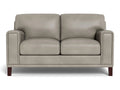 A contemporary leather loveseat with a boxy profile, wide arms, and smooth cushions, shown in light grey leather against a white background.
