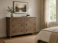 Rustic 6-drawer dresser with distressed sandstone finish, framed drawer fronts, antique-style pulls, and classic farmhouse design.
